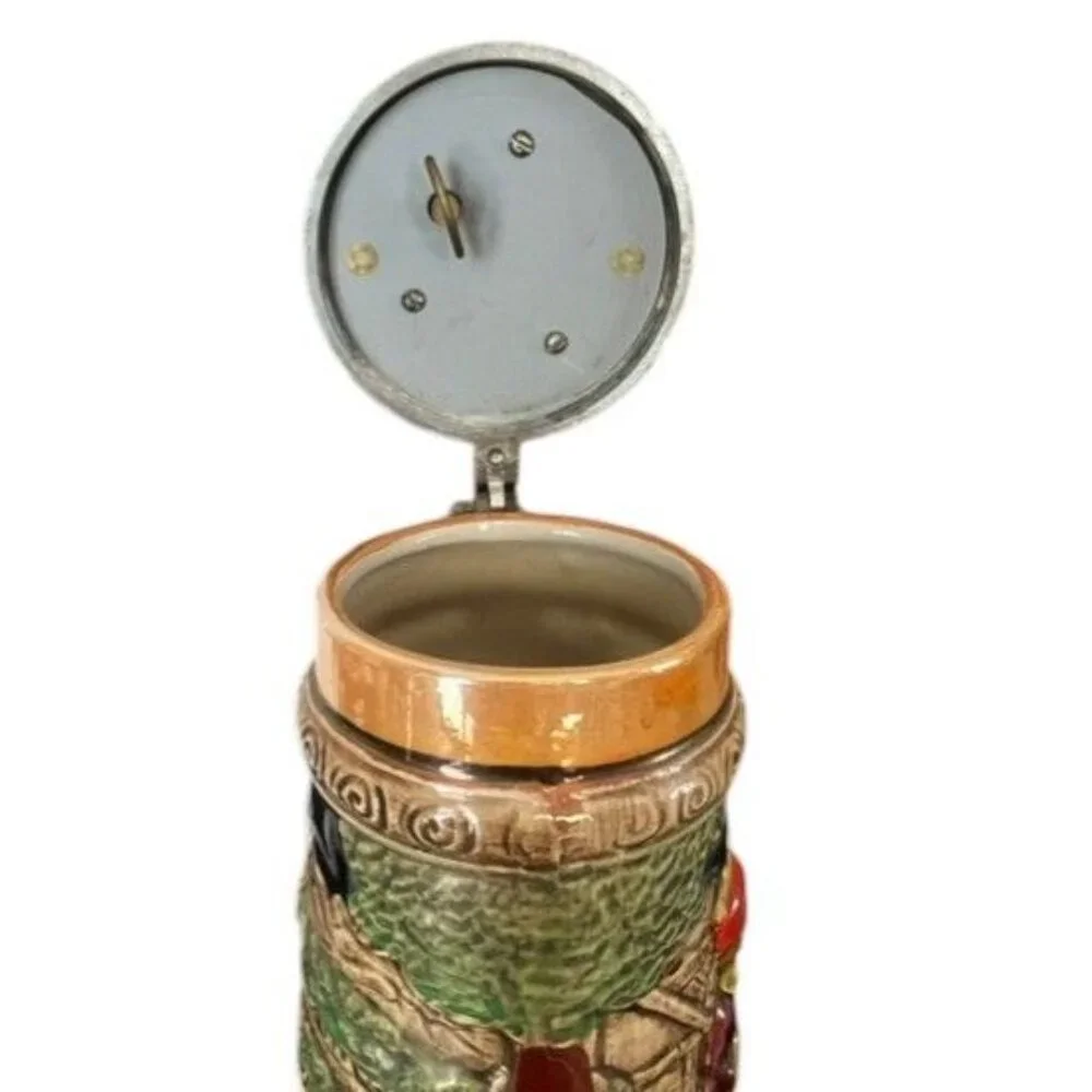 Vintage German musical beer stein,  embossed painted scenes, hinged pewter lid